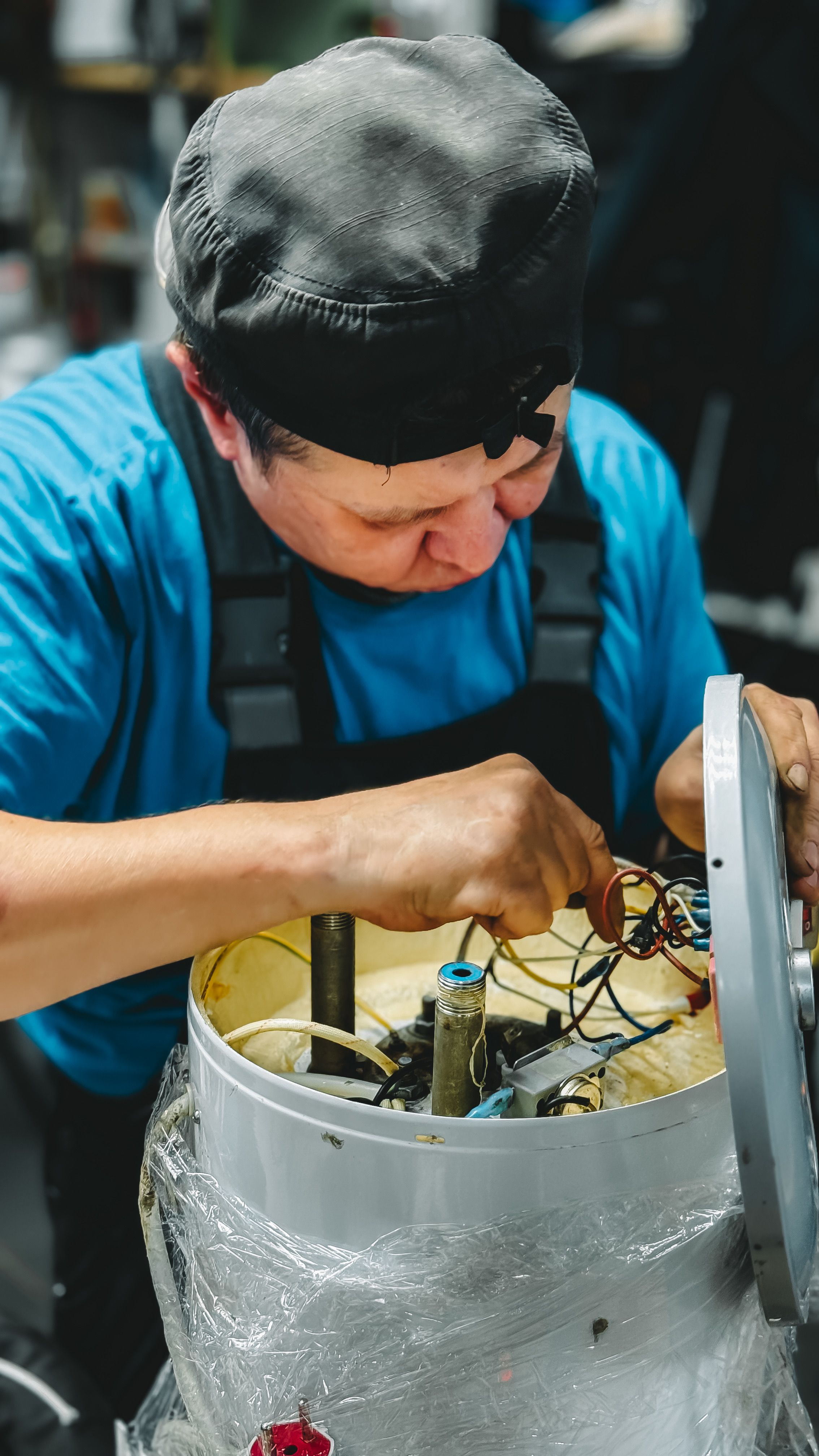 Zibuke OnCall technician repairing your air fryer with expert care