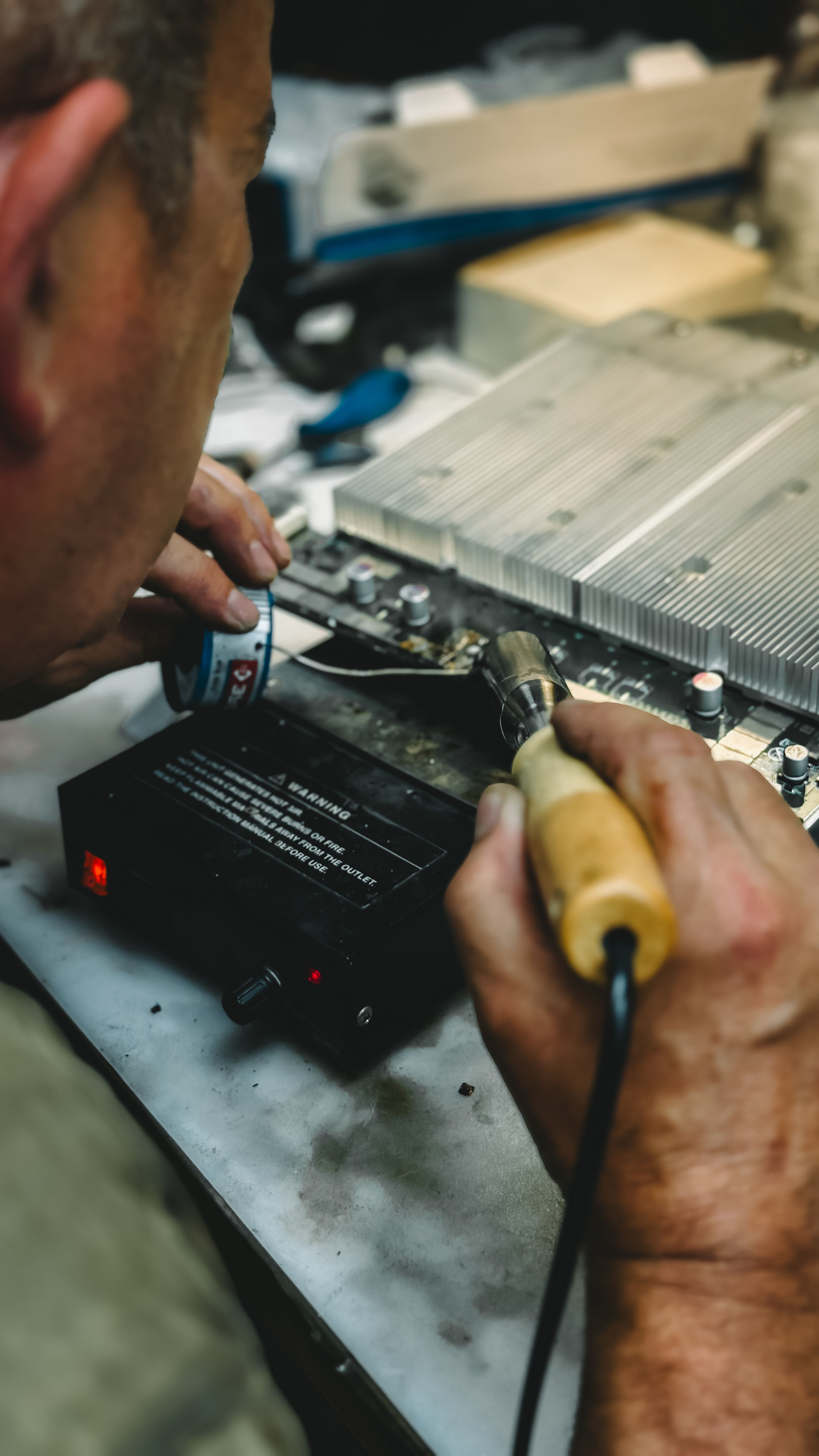 Zibuke OnCall technician repairing your home theatre with expert care
